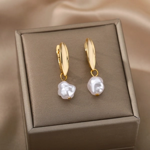 Baroque freshwater pearl earrings in gold setting on champagne silk and gift box