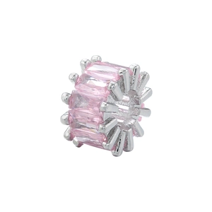 Macro view of silver-plated bead featuring micro-pave rectangular pink gemstones