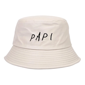Detailed view of cream bucket hat with PAPI embroidery and reinforced brim stitching