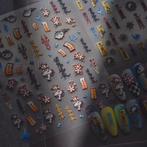 Embossed Chinese Taoist style nail art stickers with red and yellow charm patterns