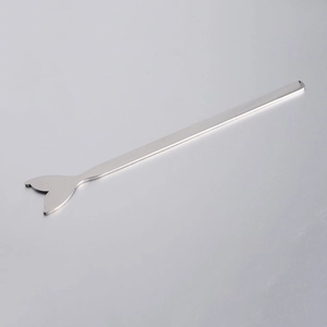 Polished stainless steel cocktail stirrer with mermaid tail handle detail