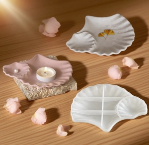 Detail showing double shell silicone mold and finished plaster jewelry storage trays