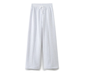 Detail of light gray wide-leg joggers with drawstring waist and vertical seam design