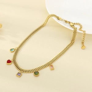 Detailed close-up of a double-layer gold chain necklace with five colorful stone pendants