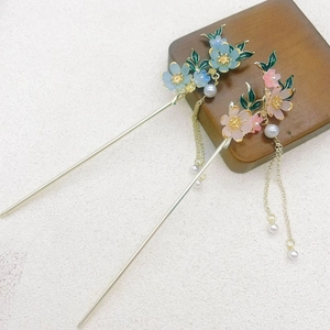 Elegant Chinese hair pins with blue and pink floral designs and pearl tassels