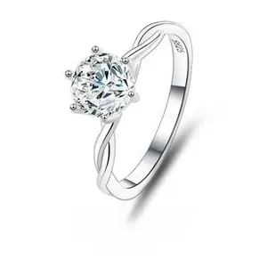 Macro shot of S925 silver ring featuring a six-prong moissanite and twisted rope band