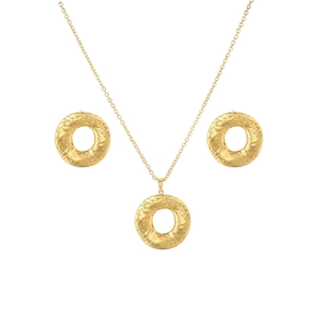 Detail view of golden jewelry set featuring irregular hammered texture round earrings and necklace