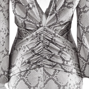 Close-up of ruched back detail and grey snakeskin print on slim-fit midi dress