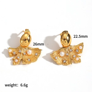 Detail of 18k gold leaf earrings with pearls and crystals including 26mm size measurements