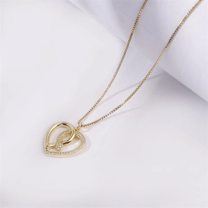 Elegant 18k gold heart pendant necklace with micro-paved cubic zirconia stones