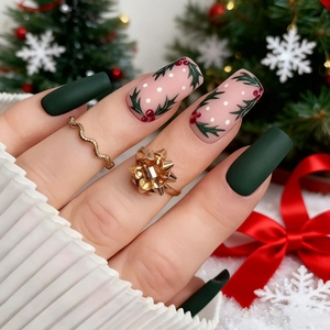 Matte green Christmas press-on nails set with holly leaf designs and golden rings