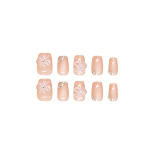 Handmade cat-eye press-on nails with 3D floral accents and pearls in peach pink