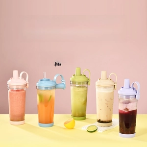 Five 850ml Tritan boba tumblers with wide straws in pastel colors shown in a row