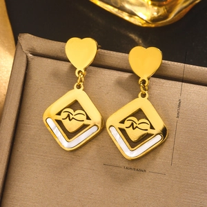 Titanium steel heart earrings with 18K gold plating and shell inlay details