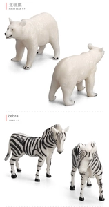 Detailed view of realistic polar bear and zebra animal models with high-quality textures