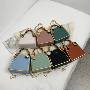 Miniature chain crossbody bag for women in seven colors with silk scarf handles
