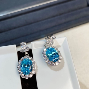 S925 Sterling Silver Aquamarine Stud Earrings with oval blue stone and diamond halo