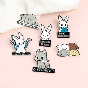 Set of 6 cartoon rabbit and cat enamel pins with humorous quotes on pink background
