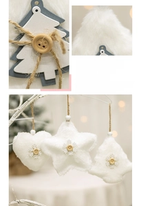Detail of white plush star and heart ornaments with wooden buttons and snowflake decor