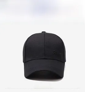 Close-up of black cotton baseball cap showing detailed Sport embroidery and curved brim