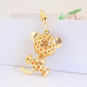 Cute golden metal tiger keychain pendant with hollow hexagonal pattern and link chain