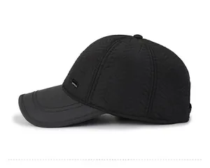 Side view of black winter baseball cap with wave pattern texture and smooth matte brim