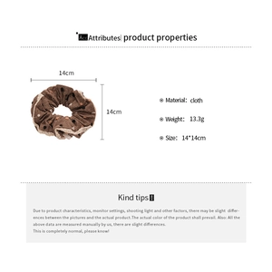 Detailed specs of a brown polka dot scrunchie with lace trim, 14x14cm cloth hair tie