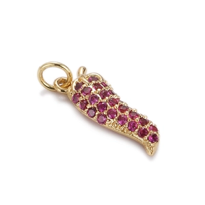 Macro detail of a 18K gold-plated chili pendant with sparkling pink zircon pavé setting