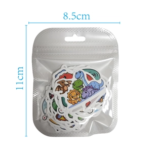Detail shot of waterproof cartoon dinosaur stickers in packaging, 8.5cm x 11cm size