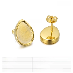 Macro view of 16x12mm golden teardrop earring studs with stainless steel post