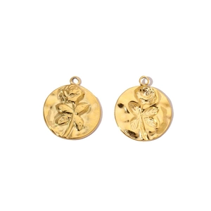 Detail of mirror polished gold stainless steel pendants with 3D rose flower relief