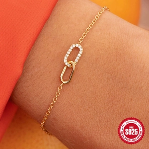 Elegant gold S925 sterling silver interlocking double ring bracelet with zircon stones