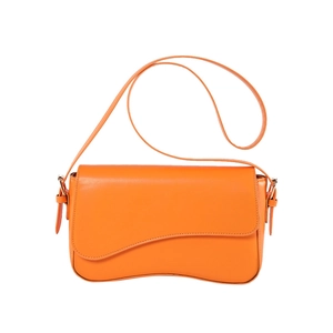 Minimalist bright orange PU leather shoulder bag with unique curved base and wave flap