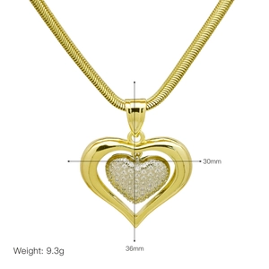 Detail view of 30x36mm gold heart pendant necklace with zircon and product dimensions