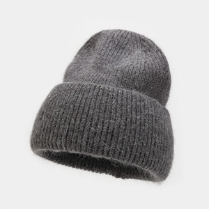 Close-up of dark grey angora rabbit hair knit hat showing soft fuzzy texture and ribbed hem