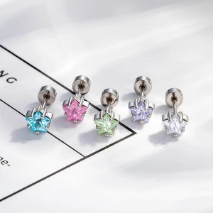 Set of five colorful star stud earrings in blue, pink, green, purple and white finishes