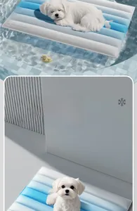 Waterproof pet cooling mat with blue stripes floating on water and used indoors