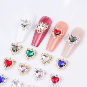 Elegant hollow heart crown nail charms with colorful zircon stones on white background