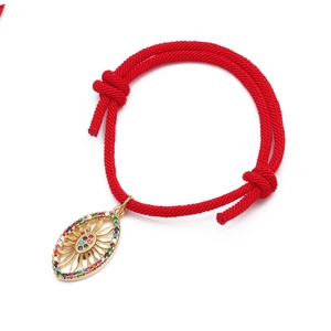 Verstellbares rotes geflochtenes Armband mit goldenem Sonnen-Auge und bunten Zirkonia