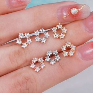 Set de pendientes de estrella en acero inoxidable con cristales en oro, plata y oro rosa