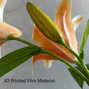 3D printed film artificial lily flower with realistic orange petals and green buds