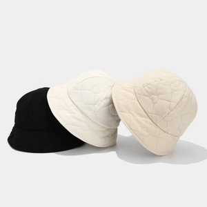 Quilted heart pattern bucket hats in black, off-white, and beige for women