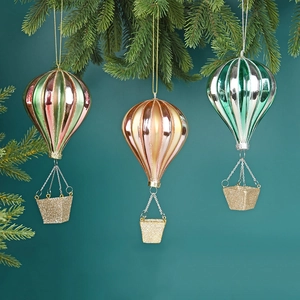 Christmas tree ornaments featuring glass painted hot air balloons with golden glitter baskets