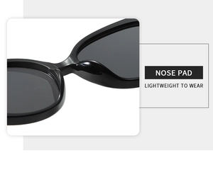 Close-up of lightweight integrated nose pads on black cat-eye chain sunglasses