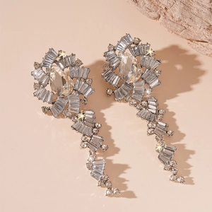 Luxury silver flower earrings with cascading water drop rhinestone tassels and sparkling crystals