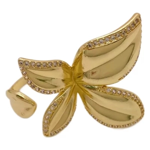 18K gold plated four-petal flower open ring with white zircon stones on white background