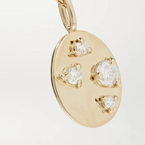 Minimalist gold plated oval pendant necklace with sparkling inset clear cubic zirconia