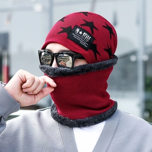 Close-up of winter knit hat and neck warmer set with thick grey fleece lining