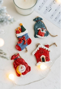 Set of 4 resin Christmas ornaments including sock and house with festive holiday decor