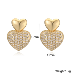 Detailed view of gold plated double heart stud earrings with 1.7cm size dimensions